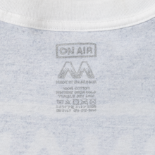 Load image into Gallery viewer, Allover Basic Logo Rug S/SL Tee (Blue)

